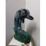 A PAINTED CARVED WOOD FIGURE OF A DOLPHIN LEAPING FROM WATER. H 53cms.