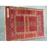 AN ANTIQUE HATCHLI BOKHARA RUG 152 x 120cm