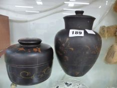 TWO CHINOISERIE LIDDED JARS.