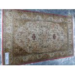 A PERSIAN SILK QUM BIRD AND ANIMAL RUG. 163 x 104cms