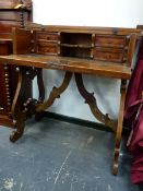 AN ITALIAN DROP FLAP WRITING TABLE, THE INTERIOR TWO SHELVES FLANKED BY PAIRS OF DRAWERS, THE SCROLL