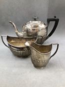 A HALLMARKED SILVER THREE PIECE TEA SET DATED 1913 LONDON FOR WILLIAM HUTTON. GROSS WEIGTH 864grms.