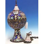 AN EGYPTIAN ENAMELLED COPPER MOSQUE LAMP, THE PIERCED BALUSTER SHAPE DECORATED IN BLUE, TURQUOISE