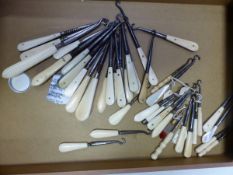 FORTY SMALL BUTTON HOOKS LARGELY WITH BONE HANDLES