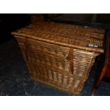 A TWO HANDLED LINEN BASKET. W 88 x D 57 x H 78cms.