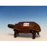 A HINGED TORTOISESHELL LINED WITH A WOOD CARVING OF THE ANIMAL AS A BOX WITH LIFT OFF LID AND