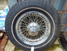 A JAGUAR E-TYPE WIRE WHEEL.