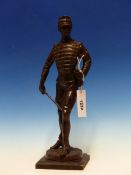 A COPPER RICH BRONZE FIGURE OF AN EARLY 20TH CENTURY SOLDIER STANDING LOOKING OVER HIS LEFT