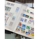A COLLECTION OF GB AND COMMONWEALTH STAMPS IN ALBUMS ETC