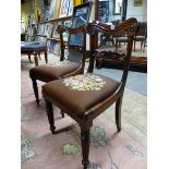 A SET OF EIGHT ROSEWOOD WILLIAM IV DINING CHAIRS, EACH WITH YOKE SHAPED TOP RAIL, FOLIATE HORIZONTAL