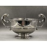 A HALLMARKED SILVER LARGE TWO HANDLED PUNCH BOWL WITH ARMORIAL ENGRAVING. DATED 1904 LONDON, FOR