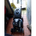 A MCCULLOCH PETROL LAWN MOWER.