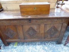 AN ANTIQUE OAK COFFER THE FRONT CARVED WITH ARCHES ABOVE THREE PANELS CARVED WITH DIAMOND FRAMES ENC