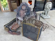 A LARGE CAST IRON FIRE BASKET FOR RESTORATION, TWO SPARK GUARDS, TWO FENDERS, A PAIR OF FIRE DOGS,