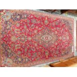 A PERSIAN TABRIZ RUG, 240 X 142cm