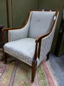 AN EDWARDIAN LINE INLAID MAHOGANY SHOWFRAME ARMCHAIR, THE RECTANGULAR BACK AND UNDERSIDE OF THE ARMS