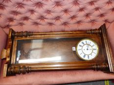 A VIENNA REGULATOR IN STAINED WOOD CASE, THE WHITE ENAMEL DIAL WITH SUBSIDIARY SECONDS, THE CASE.