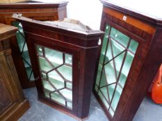 THREE ASTRAGAL GLAZED MAHOGANY CORNER CABINETS, EACH WITH PAINTED SHELF INTERIORS, THE TALLEST. W 79