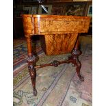A VICTORIAN MARQUETRIED BURR WALNUT WORK TABLE, THE FITTED DRAWER AND SLIDE OUT WORK BAG BETWEEN GU