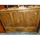 AN ANTIQUE OAK MULE CHEST, THE THREE DIAMOND INLAID PANELS ABOVE TWO DRAWERS. W 117 x D 59 x H 88cms