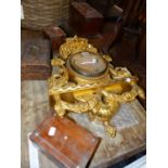 A GILT WOOD FLORAL CLOCK CASE, A ROSEWOOD SARCOPHAGUS TEA CADDY AND FOUR VARIOUS BOXES