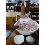 AN ANTIQUE WASH JUG AND BASIN, TWO PARASOLS, AND AN ORIENTAL PAGE TURNER.