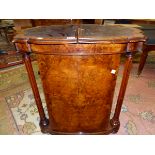 A VICTORIAN BURR WALNUT WRITING TABLE AND CANTERBURY, THE LEATHER INSET TOP OPENING OVER COLUMNS