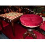 A VICTORIAN MAHOGANY PIANO STOOL, THE ROUND BUTTON UPHOLSTERED SEAT ADJUSTABLE ON THE FOLIATE CARVE