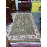 A DOMESTIC MACHINE MADE CARPET OF PERSIAN DESIGN 300 x 201cm