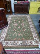 A DOMESTIC MACHINE MADE CARPET OF PERSIAN DESIGN 300 x 201cm