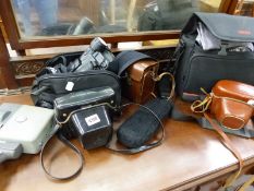 VINTAGE CAMERAS TO INCLUDE EDIXA, LUBITEL, PENTACON, A PANASONIC VIDEO CAMERA AND AN ELMO CINE