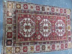 AN ANTIQUE CAUCASIAN RUG, 160 x 98 cm