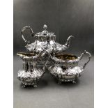 A VICTORIAN HALLMARKED SILVER THREE PEICE TEA SET WITH GILDED INTERIORS. ALL THREE PIECES DATED