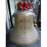 A SHIPS BELL INSCRIBED SAMSON 1954 TO ONE SIDE BELOW THE RED PAINTED SUSPENSION LUGS. H 34cms.