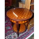 A FRENCH LOUIS XVI STYLECUBE PARQUETRY CIRCULAR TWO TIER TABLE WITH AN APRON DRAWER ABOVE TAPERING S
