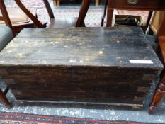 AN VINTAGE EBONISED PINE TWO HANDLED TRUNK. W 92 x D 46 x H 43cms.