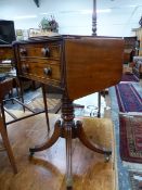 A REGENCY MAHOGANY FLAP TOP TWO DRAWER TABLE ON TURNED COLUMN, THE REEDED LEGS DOWNSWEPT TO BRASS C