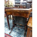 A VICTORIAN BURR WALNUT GAMES TABLE, THE SERPENTINE FRONTED TOP SWIVELLING OPEN TO REVEAL CHESS AND