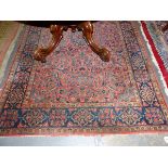 AN ANTIQUE PERSIAN KESHAN RUG 211 x 130cm