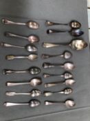 A SMALL COLLECTION OF GEORGIAN AND LATER HALLMARKED SILVER SPOONS.