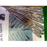 TEN SILVER HANDLED BUTTON HOOKS, FIFTEEN VOLUMES OF THE BUTTON HOOK SOCIETY PUBLICATIONS FROM 1980,