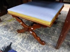 A MAHOGANY STOOL WITH THE UPHOLSTERED SEAT WITH X-SHAPED LEGS JOINED CENTRALLY BY A TURNED