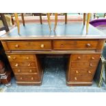 A VICTORIAN MAHOGANY PEDESTAL DESK, THE LEATHERETTE INSET TOP WITH TWO APRON DRAWERS, FOUR DRAWERS O