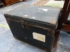 A CLOSE NAILED BLACK CANVAS TWO HANDLED TRUNK. W 60 x D 43cms.