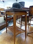 AN EDWARDIAN SATIN WOOD CROSS BANDED MAHOGANY SWIVEL FLAP TOP TABLE, THE LINE INLAID TAPERING SQUARE