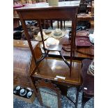 A MAHOGANY CUT WORK FRAMED RECTANGULAR MIRROR, A LINE INLAID MAHOGANY RECTANGULAR TWO TIER TABLE AND