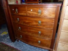 A VICTORIAN MAHOGANY BOW FRONT CHEST OF TWO SHORT AND THREE BRASS RING HANDLED GRADED LONG DRAWERS