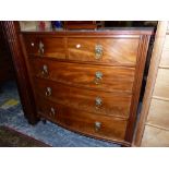 A VICTORIAN MAHOGANY BOW FRONT CHEST OF TWO SHORT AND THREE BRASS RING HANDLED GRADED LONG DRAWERS