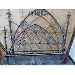 A WROUGHT IRON DOUBLE BED HEAD, FOOT AND SIDE BARS, THE OPEN WORKED GOTHIC ARCHES WITH QUATREFOILS