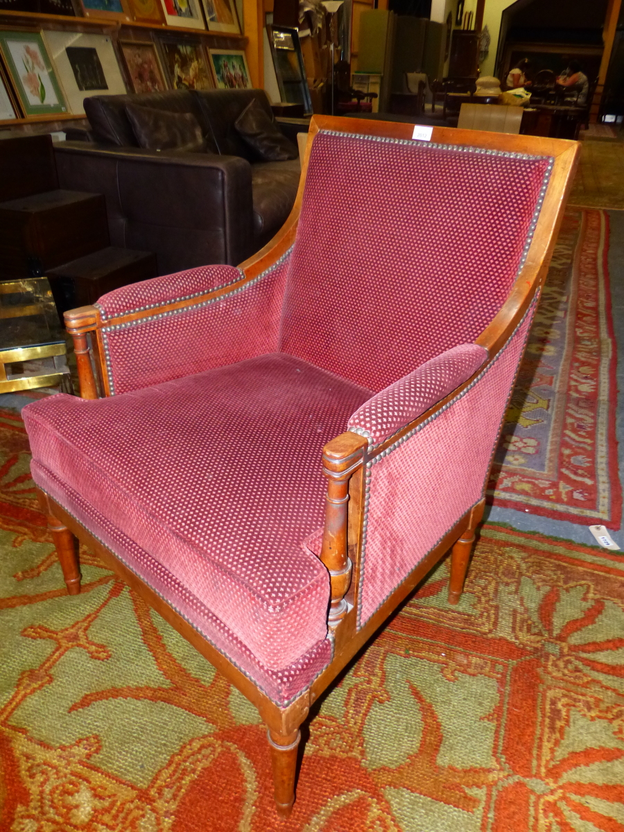 A PAIR OF FRENCH NEOCLASSIC FRUITWOOD SHOW FRAME ARMCHAIRS, THE SQUARED BACK ARMS AND SEATS UPHOLSTE